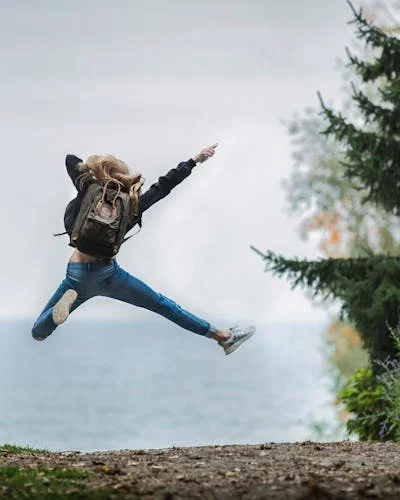 Woman jumping in nature